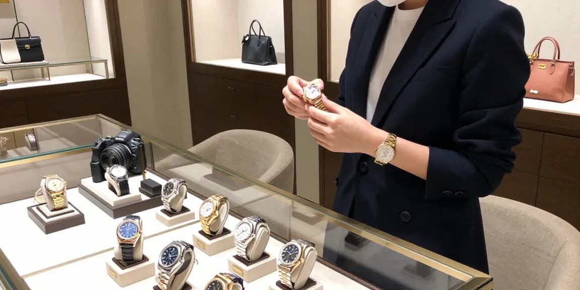 Stylish individual exploring replica watches in a luxurious boutique with elegant decor and designer accessories.